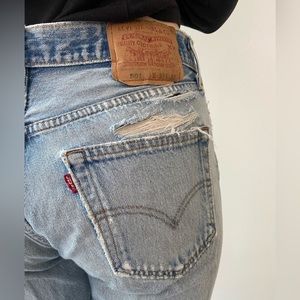 Very worn in ripped Levi’s 501 pale wash size 32/32